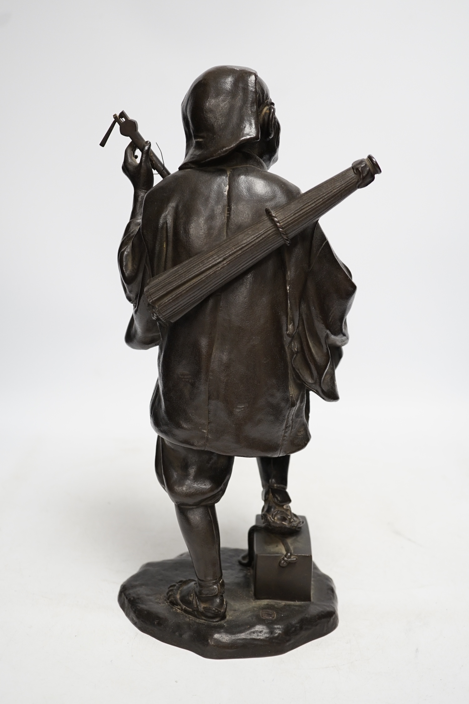 A Japanese bronze figure of a musician, Meiji period, signed, 37cm high. Condition - good